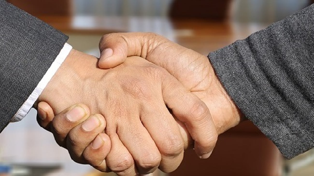 merger handshake deal 