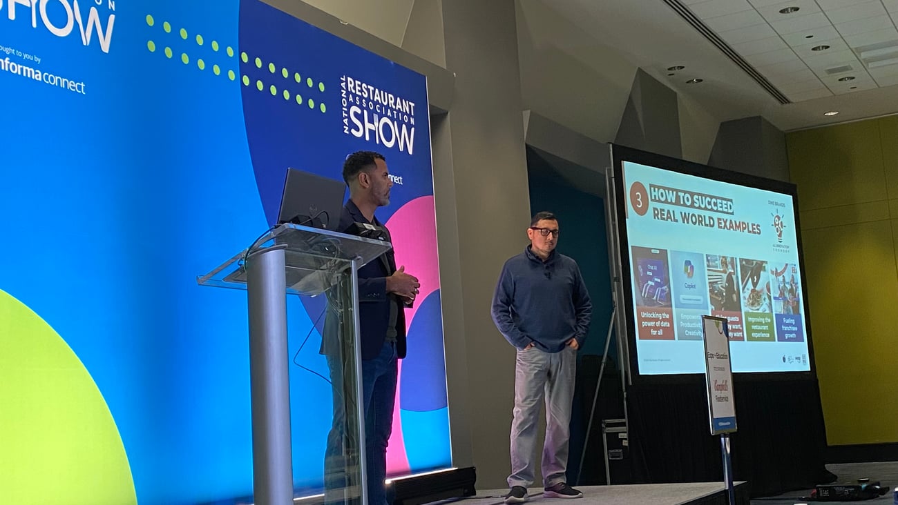 Dine Brands execs onstage at NRA 2025
