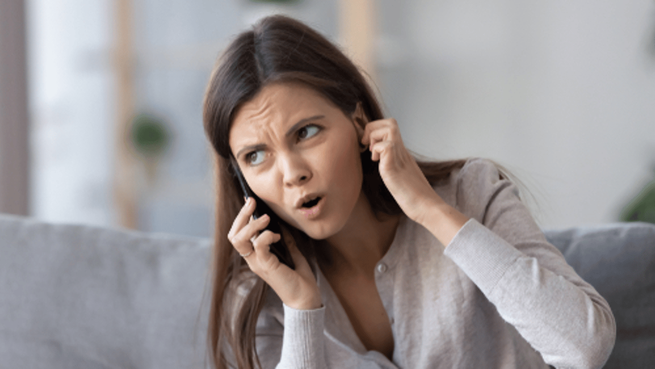 annoyed caller on phone 