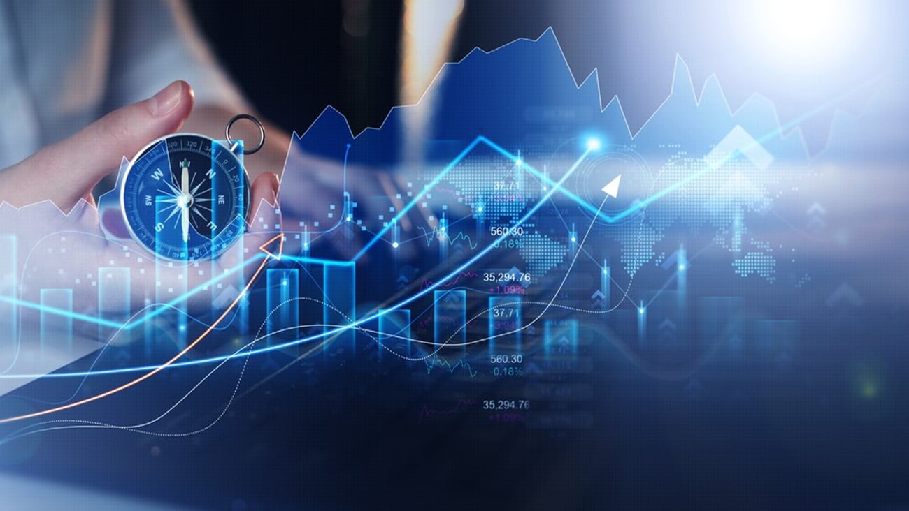Business person using navigation compass with digital graphics for the right direction and successful business with growing revenue.  Investment of growth on currency rate and business strategy plan.; Shutterstock ID 2223328903