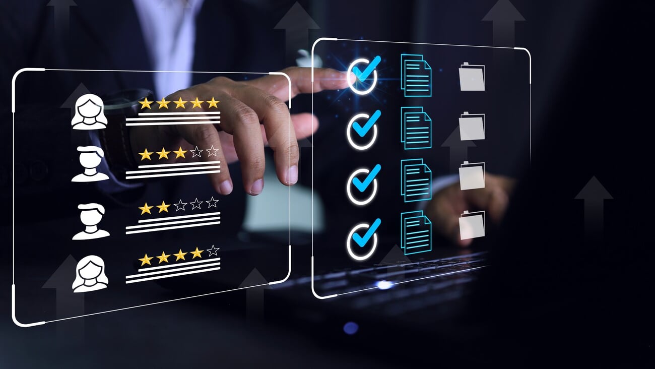 Businessman click blue check mark on laptop screen to vendor evaluate or supplier feedback industrial facility and rated a maximum of five stars according to the ISO documentation management system.; Shutterstock ID 2340902517