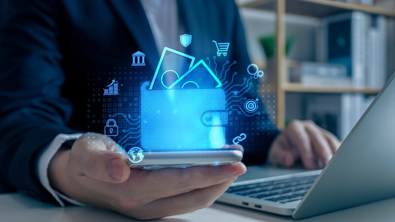 Businessman Hand Using Mobile Phone to Connect Digital Wallet. Mobile banking, online finance, e-commerce, Smart, E-wallet, Financial and Economy.; Shutterstock ID 2385062097