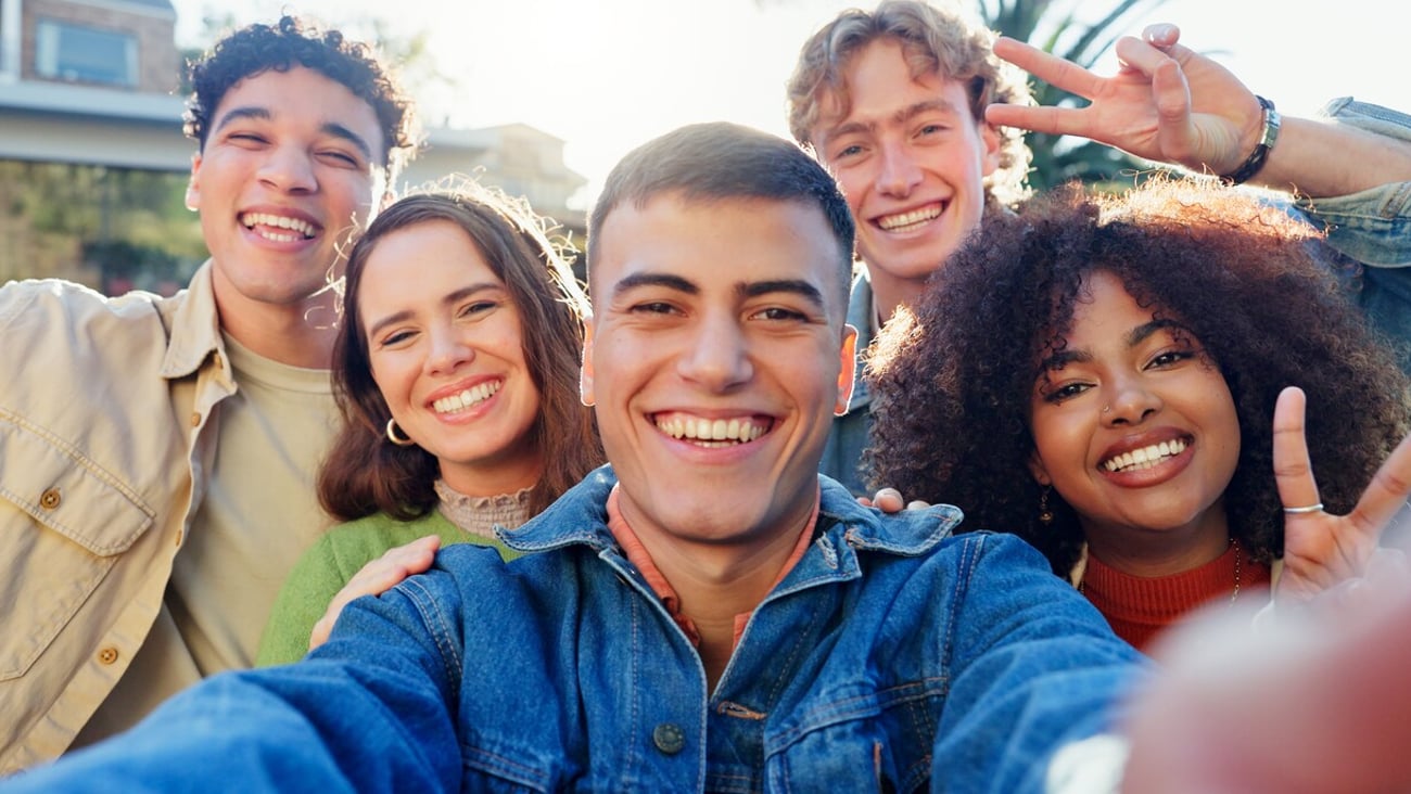 Friends, portrait and selfie in backyard on holiday and get together or hangout with peace sign on social media. Excited young people in group profile picture for bonding, gen z and diversity outdoor; Shutterstock ID 2475097517