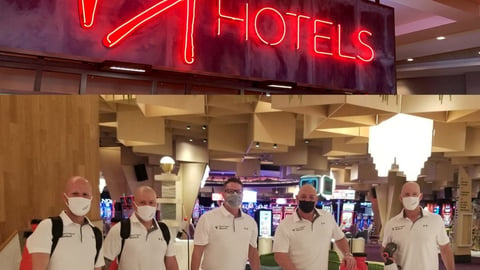 a group of people standing in front of a building