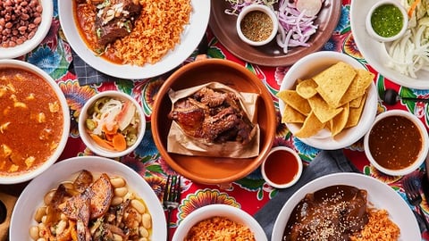 a bowl filled with different types of food on a table