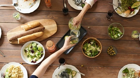 a bunch of food sitting on top of a wooden table