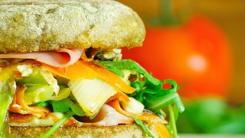 a close up of a sandwich sitting on top of a table