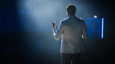 a man standing on a stage