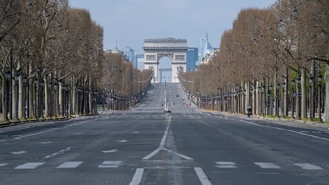 a street scene with focus on the side of a road