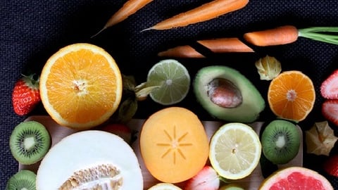 a group of oranges on a table