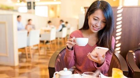 a woman sitting at a table