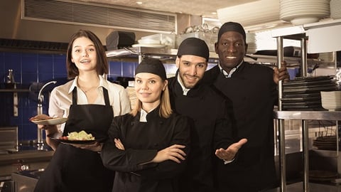 a group of people posing for the camera