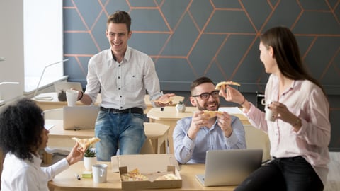 a group of people sitting at a table