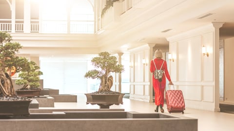 hotel guest walking through lobby