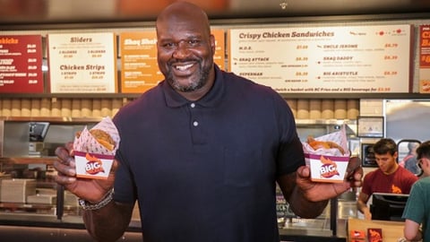 Shaquille O'Neal standing in Big Chicken