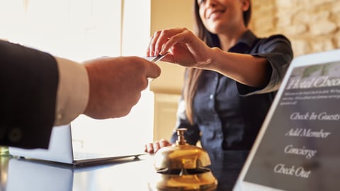 hotel guest check-in shutterstock