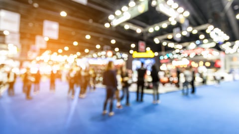 a group of people at a tradeshow