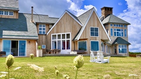 a house with a grass field