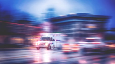 a blurry photo of an ambulance