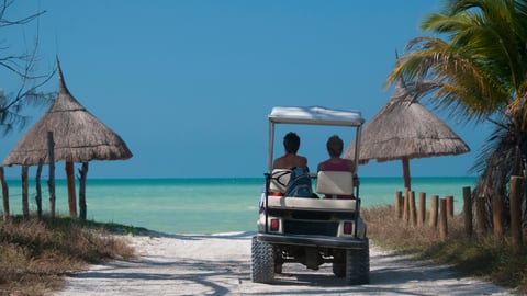 golf cart on tropical beach