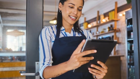 waitress using tablet