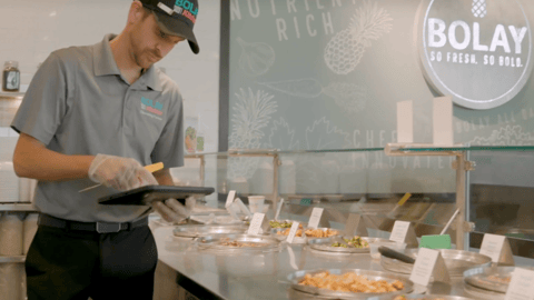 restaurant worker using tablet