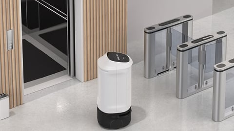 bear robotics delivery robot in front of elevator