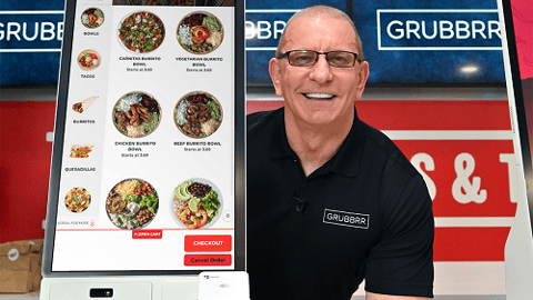 Robert Irvine with Grubbrr kiosk