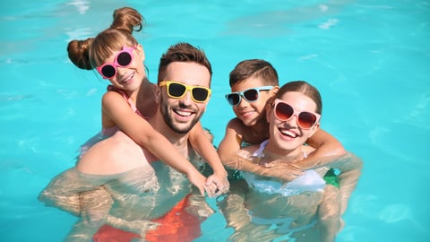 family in a pool