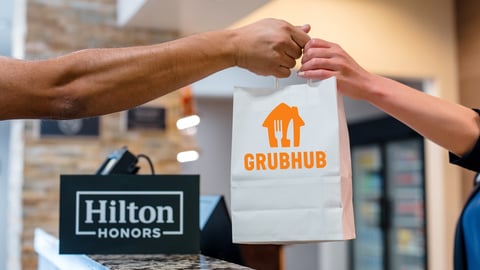 Hilton and Grubhub logos