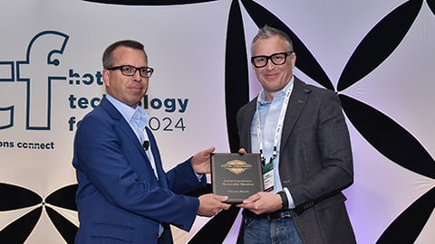 Mike Dickersbach at HTF 2024 accepting Hotel Visionary Award Honorable Mention