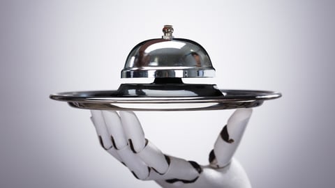 Robotic Hand Holding Service Bell In Plate Against Grey Background; Shutterstock ID 1073811788