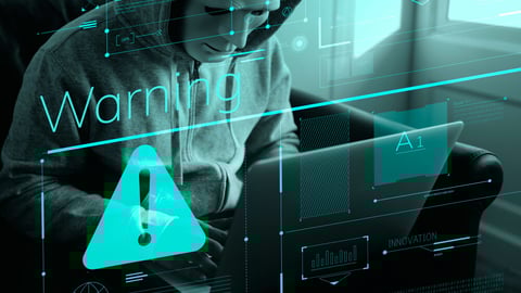 Anonymous hacker committing a computer crime; Shutterstock ID 1097113940