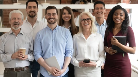 Happy diverse professional business team stand in office looking at camera, smiling young and old multiracial workers staff group pose together as human resource, corporate equality concept, portrait; Shutterstock ID 1437231731