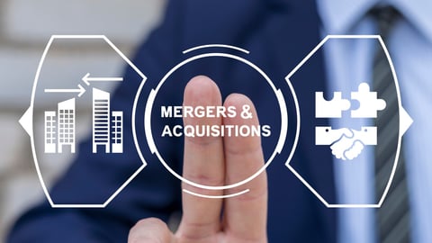 Mergers and acquisitions business concept. Merger and Acquisition Corporate Cooperation Companies. M and A deal partnership. Man working on virtual touch screen presses text: MERGERS AND ACQUISITIONS.; Shutterstock ID 2481159695