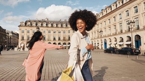 two travelers laughing