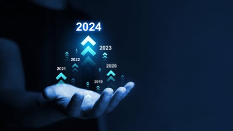 hand with digital years leading up to 2024