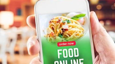 Online ordering on iphone with man hands