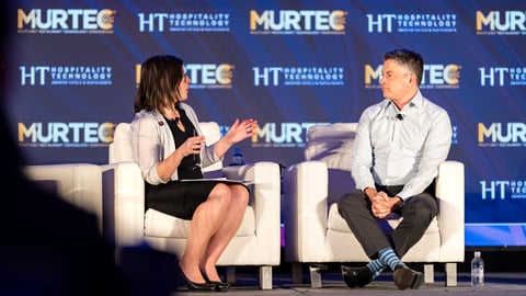 Abby Lorden and Dine Brands CEO John Peyton on stage at MURTEC 2024