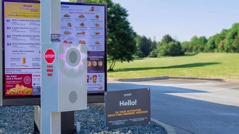 Taco Johns drive-thru with digital sign 