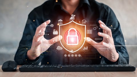 Businessman holding shield protect icon. Protection network security computer and safe your data concept, lock symbol, concept about security, cybersecurity and protection against dangers.; Shutterstock ID 2136966131