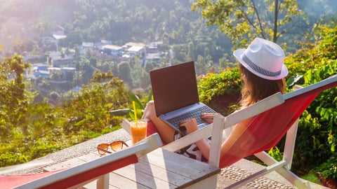 Girl freelancer work typing on laptop and looking at monitor with beautiful view and cocktail outdoors sun sky and greens. Traveling with a computer. Online dream job on the island in Thailand concept; Shutterstock ID 1037723986