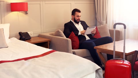 Picture showing tired businessman relaxing in hotel room; Shutterstock ID 529715740