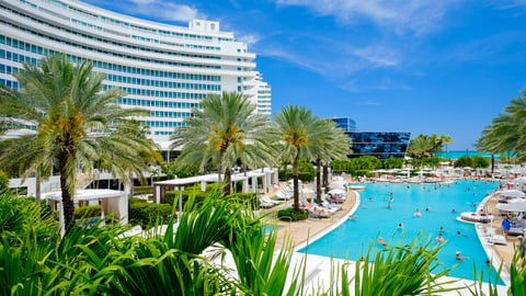 MIAMI BEACH, FLORIDA USA  - APRIL 21, 2013: The historic Fontainebleau Hotel by architect Morris Lapidus on Miami Beach is a popular international tourist destination.; Shutterstock ID 188451401