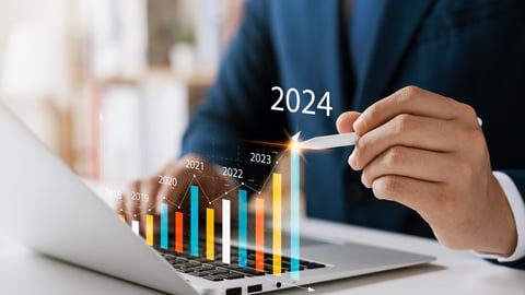 Businessman analyzes profitability of working companies with digital augmented reality graphics, positive indicators in 2024, businessman calculates financial data for long-term investments.; Shutterstock ID 2273999575