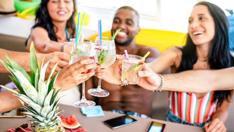 Trendy people toasting fancy cocktails at boat party trip - Young millenial friends having fun on luxury vacation - Travel life style concept with vacationer sharing aperitif drink with tropical fruit; Shutterstock ID 2292035723