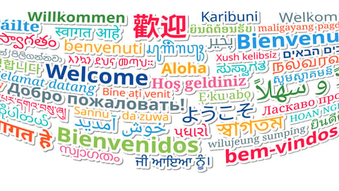 Composition of "Welcome" messages in many different written languages, isolated colorful texts. Vector Illustration.; Shutterstock ID 590290463