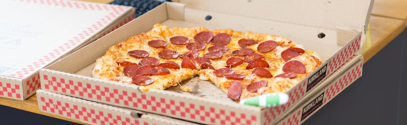 Fresh pepperoni pizza in a delivery box