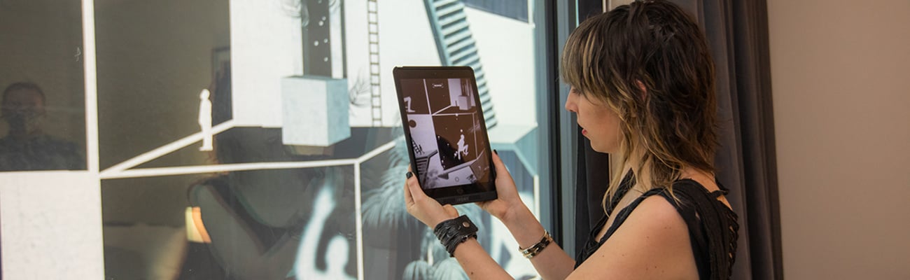 a person standing in front of a computer