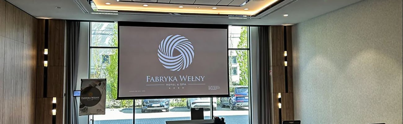 Fabryka Welny Hotel interior with AV screen